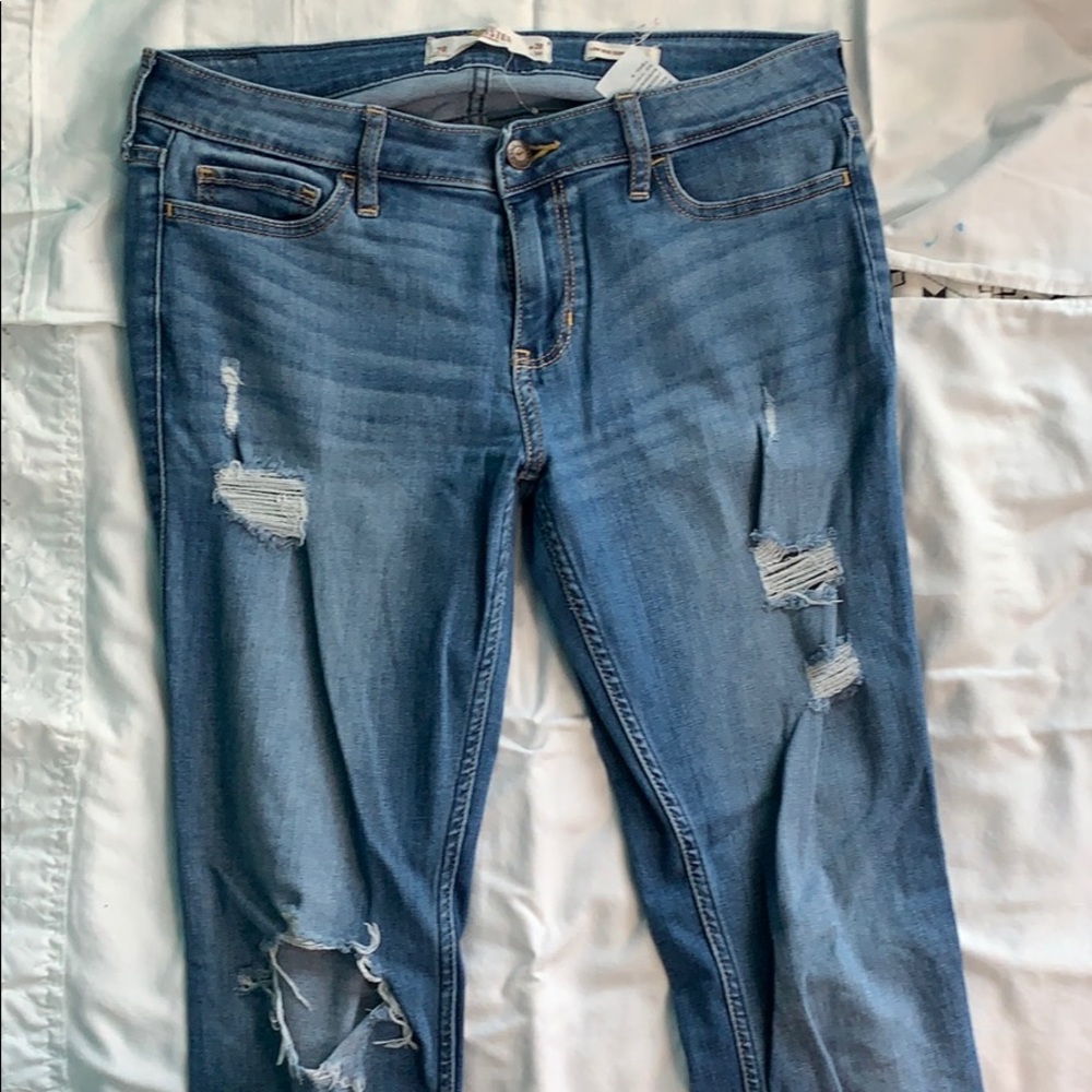 One pair Ripped Hollister Jeans